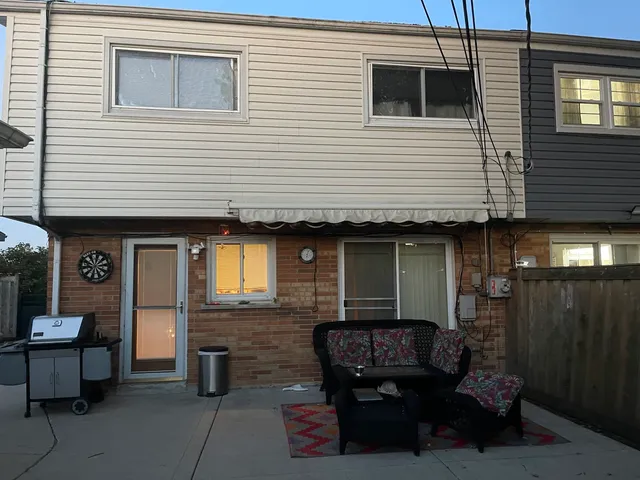 a front view of a house with a garage