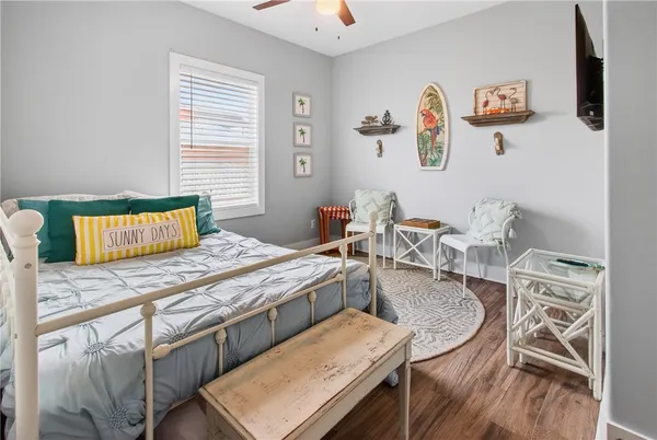 a bedroom with a bed and a table in it