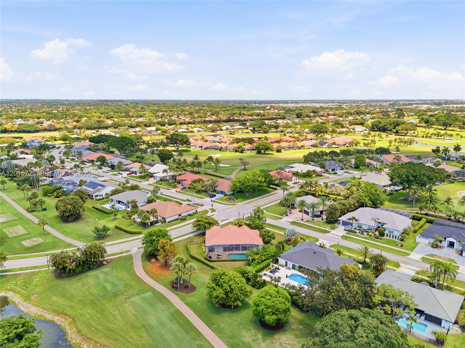11008 Boca Woods Lane Boca Raton, FL 33428 - Photo 50 of 70 an aerial view of residential houses with outdoor space