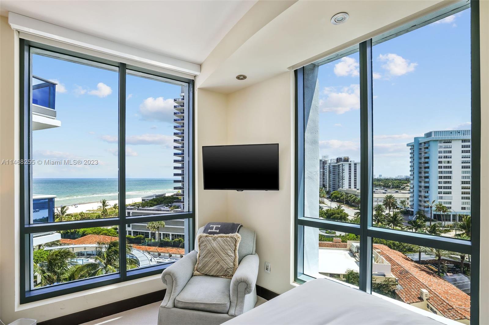 5959 Collins Avenue, Unit 902 Miami Beach, FL 33140 - Photo 27 of 46 a living room with furniture