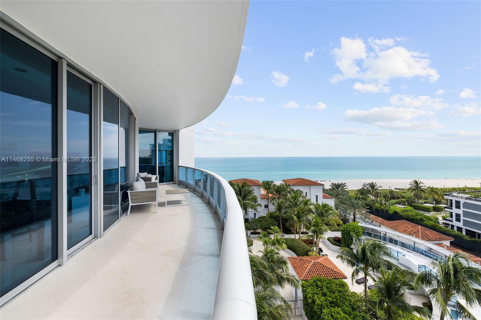 5959 Collins Avenue, Unit 902 Miami Beach, FL 33140 - Photo 36 of 46 a view of a city from a balcony