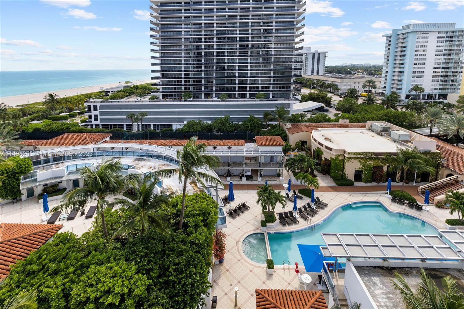 5959 Collins Avenue, Unit 902 Miami Beach, FL 33140 - Photo 40 of 46 a view of a city with tall buildings