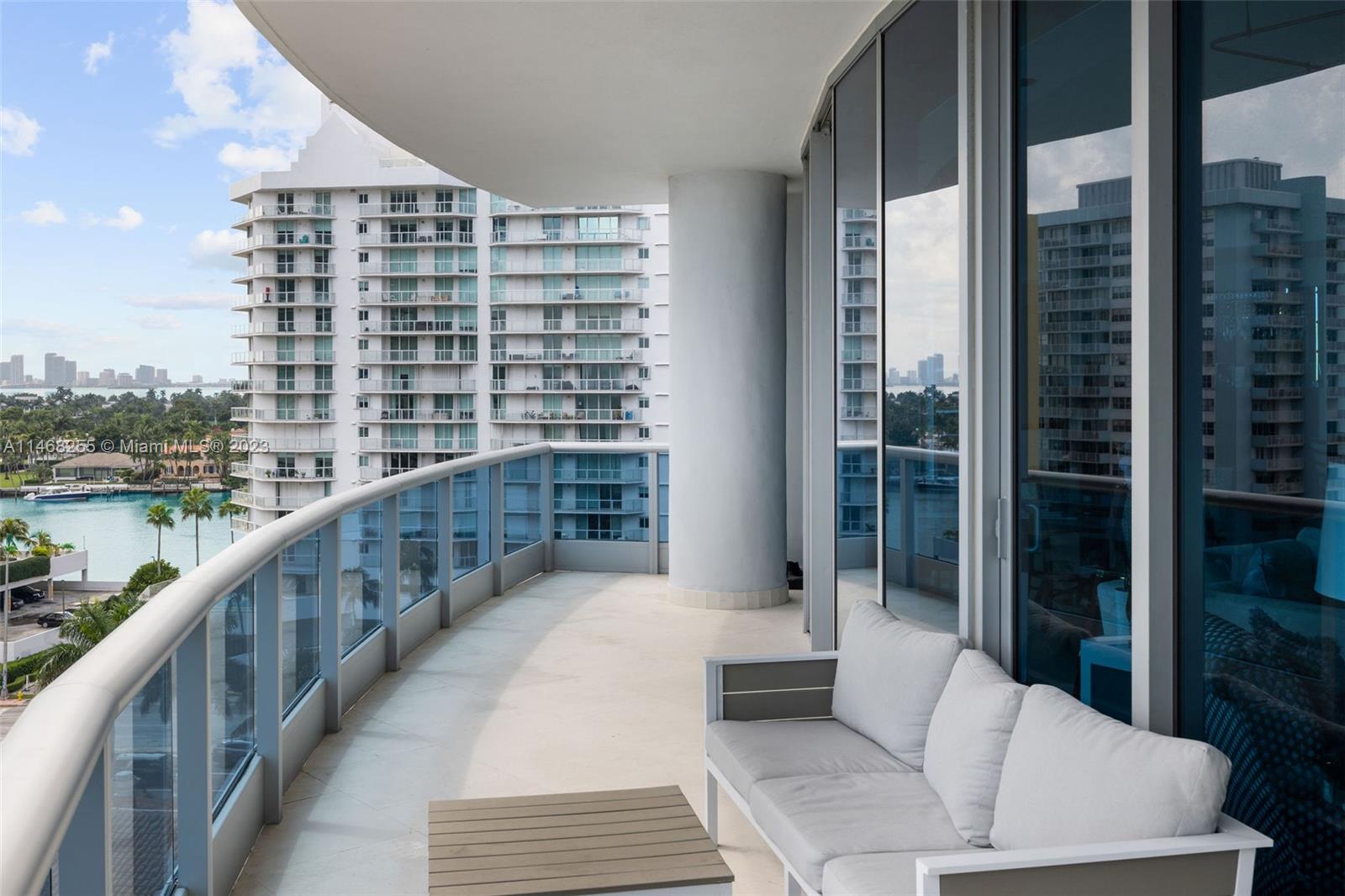 5959 Collins Avenue, Unit 902 Miami Beach, FL 33140 - Photo 8 of 46 a view of balcony with couch