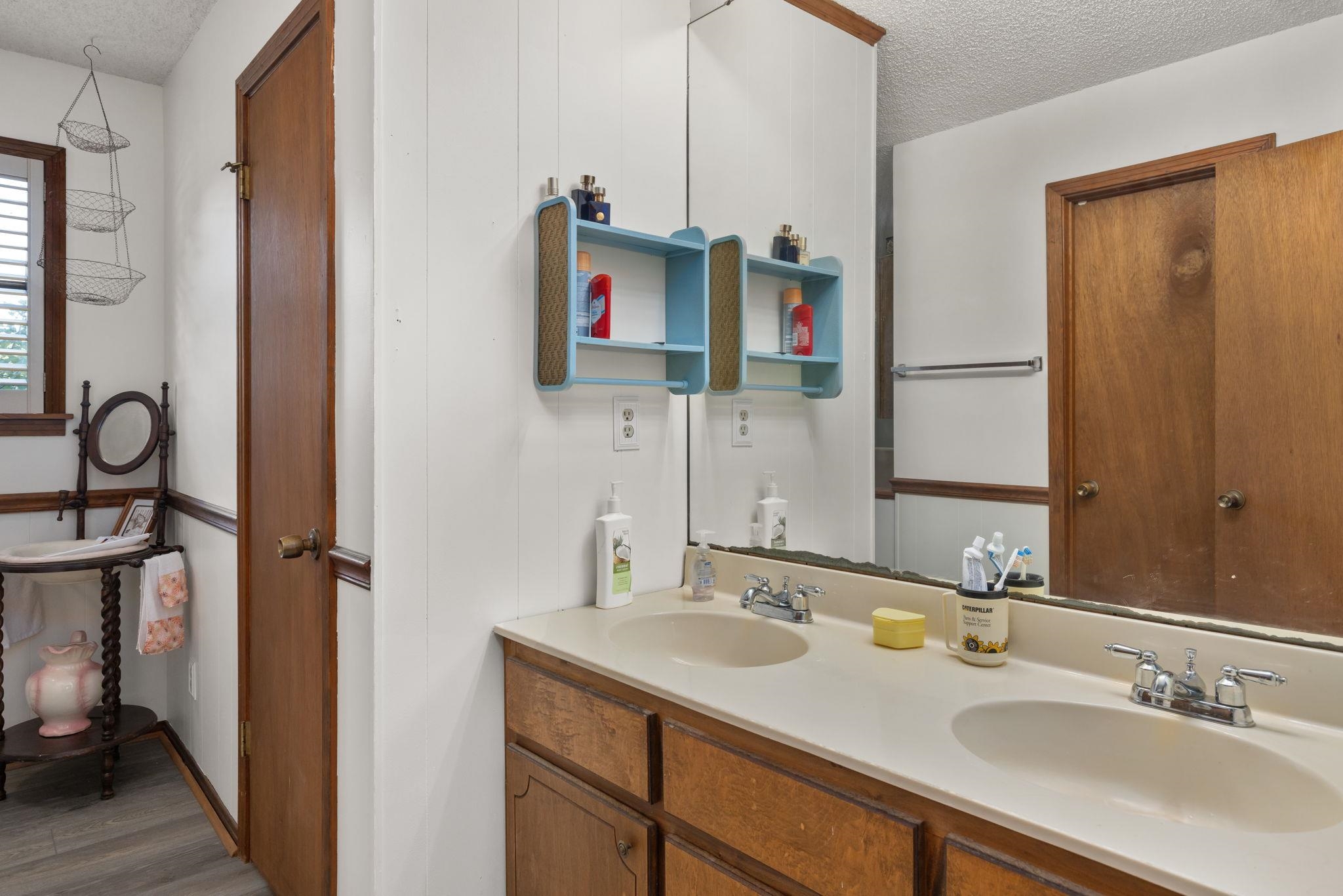 11 Barnstable Road Corinth, MS 38834 - Photo 16 of 40 a bathroom with a sink and a mirror