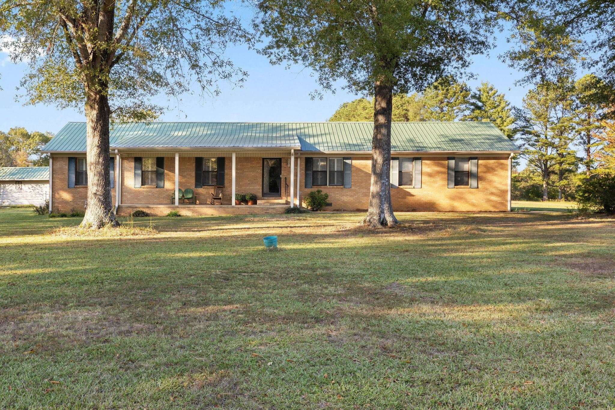 11 Barnstable Road Corinth, MS 38834 - Photo 2 of 40 a front view of a house with a garden