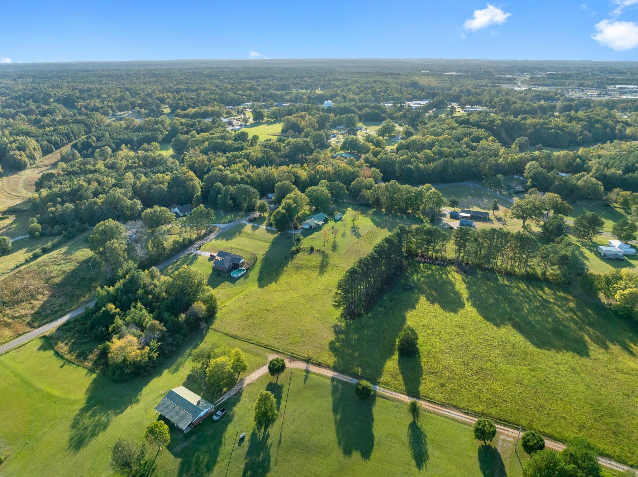 11 Barnstable Road Corinth, MS 38834 - Photo 35 of 40 an aerial view of residential houses with outdoor space and lake view