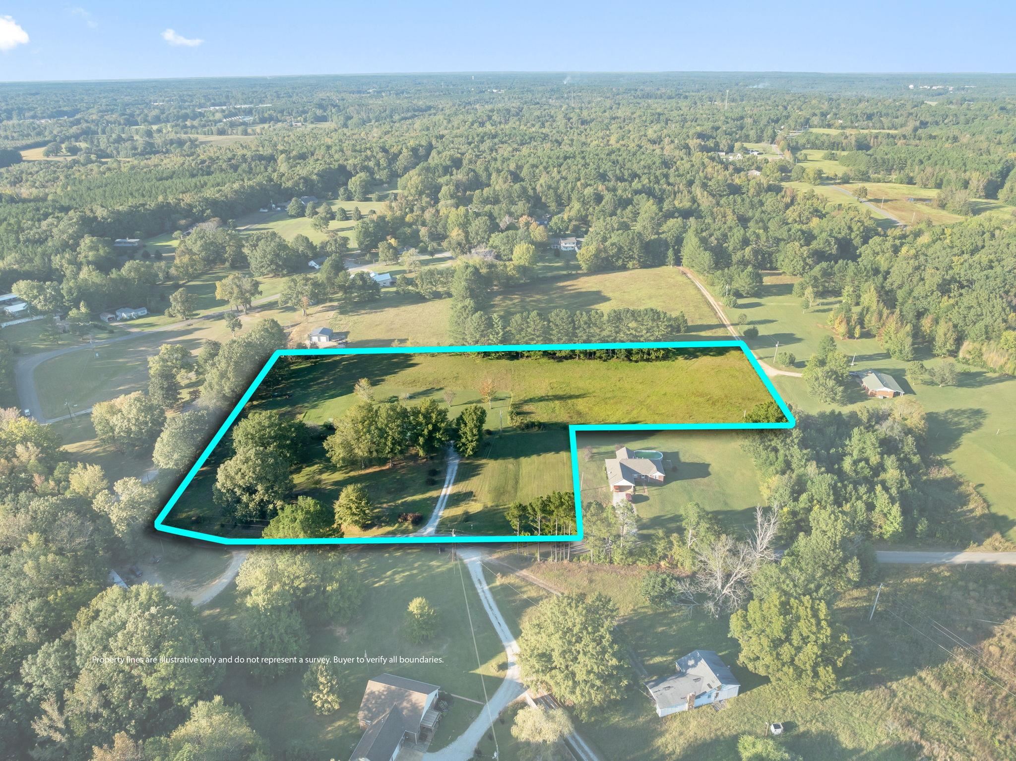 11 Barnstable Road Corinth, MS 38834 - Photo 40 of 40 a view of a lake with a mountain in the background
