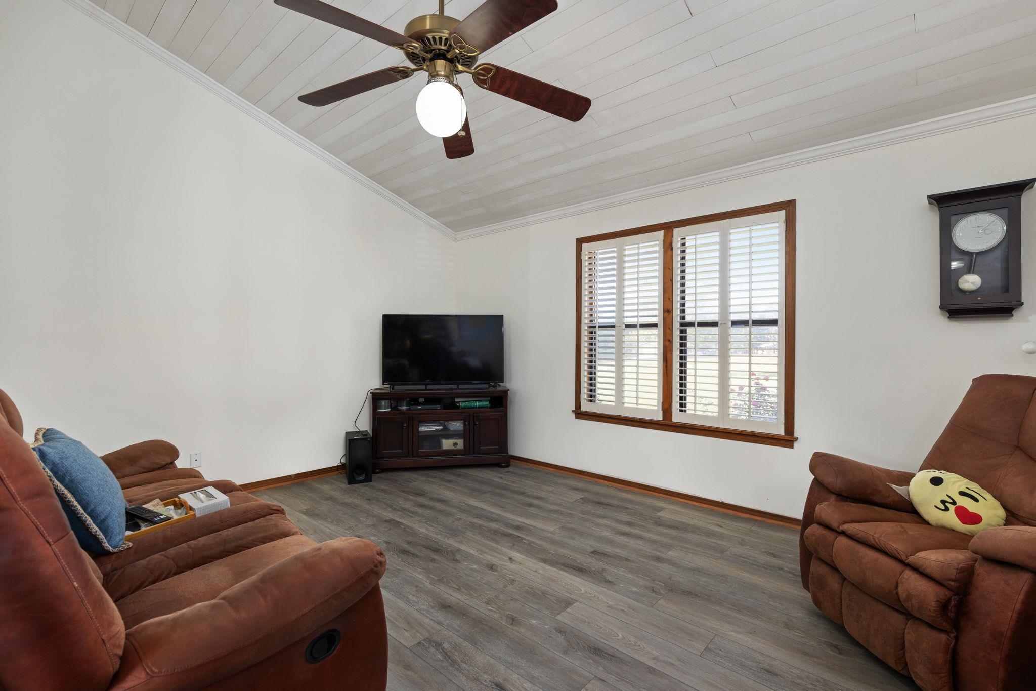 11 Barnstable Road Corinth, MS 38834 - Photo 7 of 40 a living room with furniture and a flat screen tv