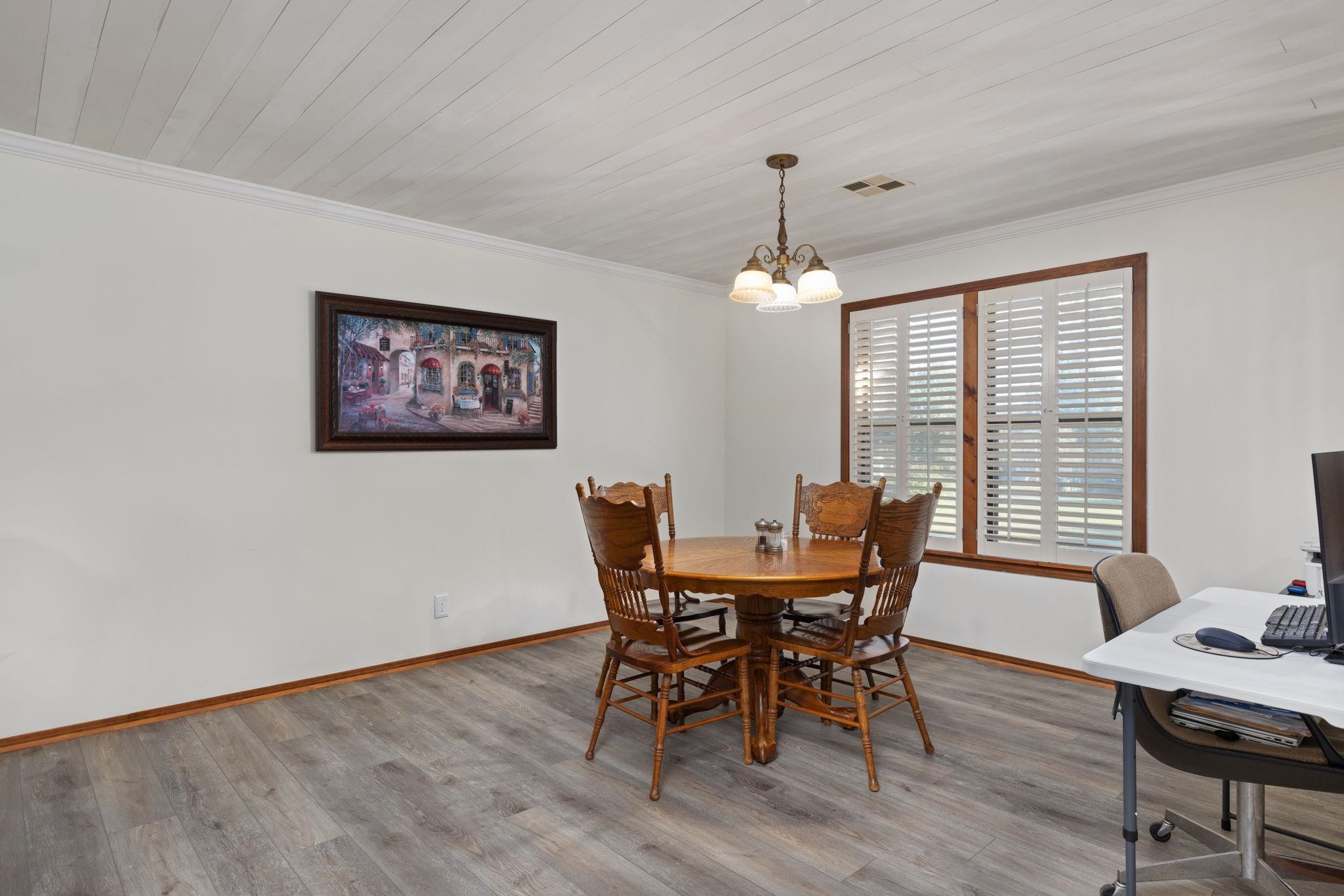 11 Barnstable Road Corinth, MS 38834 - Photo 9 of 40 a view of a dining room with furniture window and wooden floor