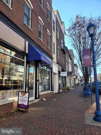 a view of a building with sitting area