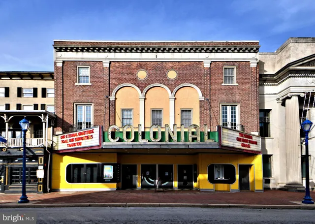 a front view of multi story residential apartment building