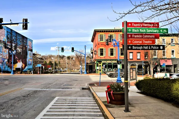 a view of a street with cars