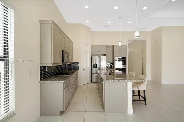 $5,000 | 11815 Leon Circle North, Unit 11815, Parkland, FL 33076