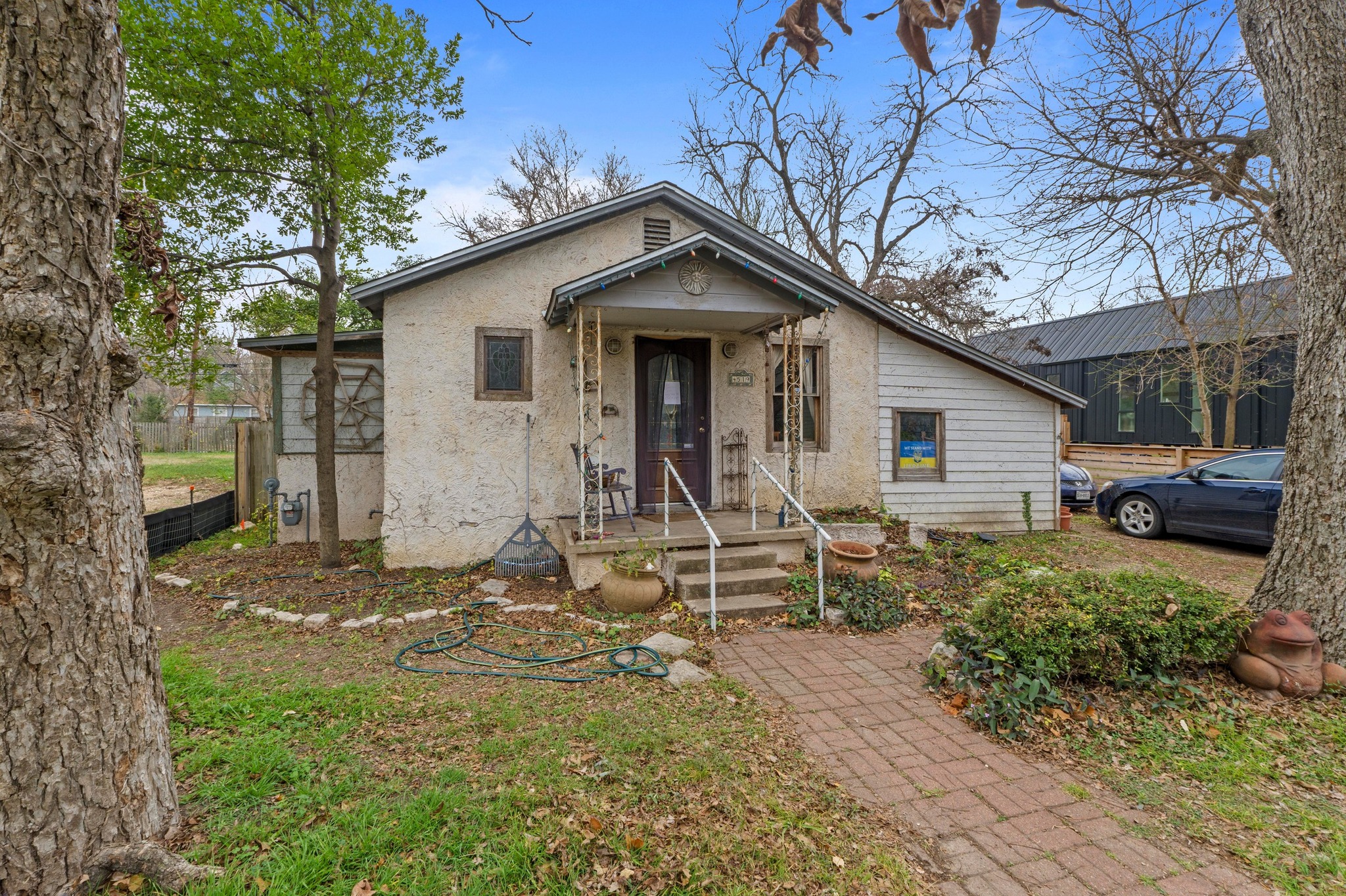 4519 Avenue D Austin, TX 78751 - Photo 6 of 18 Bungalow-style home featuring stucco siding