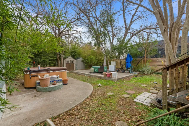 a house view with a sitting space garden