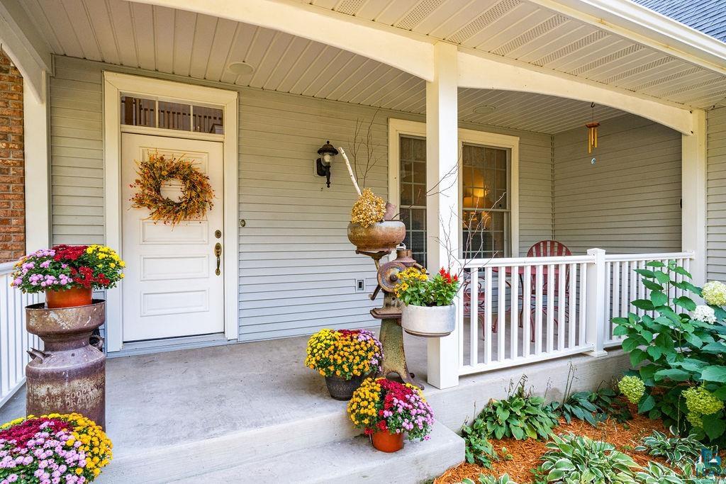 3168 Pioneer Road Barnum, MN 55707 - Photo 11 of 46 This quaint front porch is a great spot to enjoy a morning view of the deer in the woods out front. It's sheltered year long from the elements.