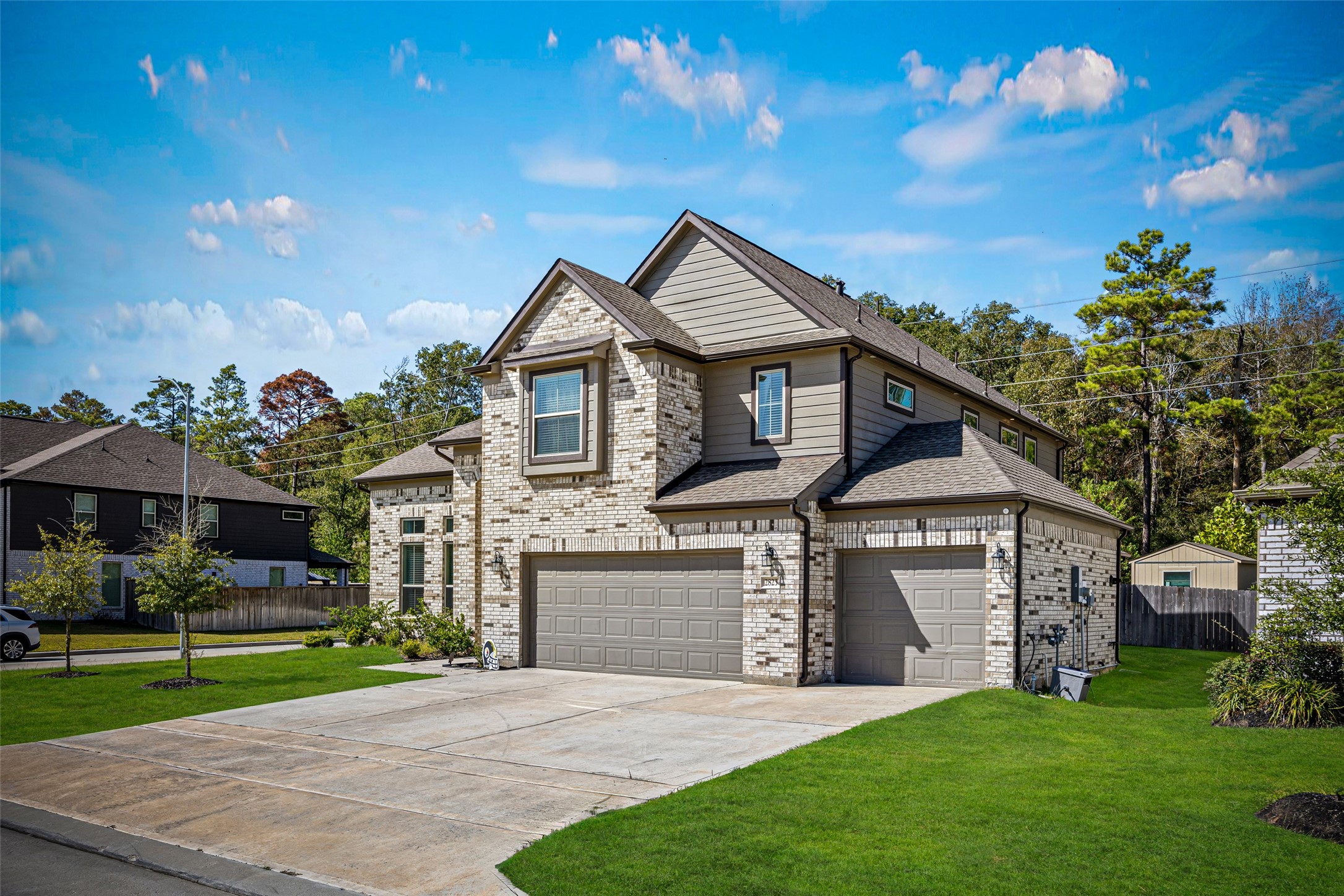 2823 Skerne Forest Drive Spring, TX 77373 - Photo 3 of 43 a front view of a house with a yard
