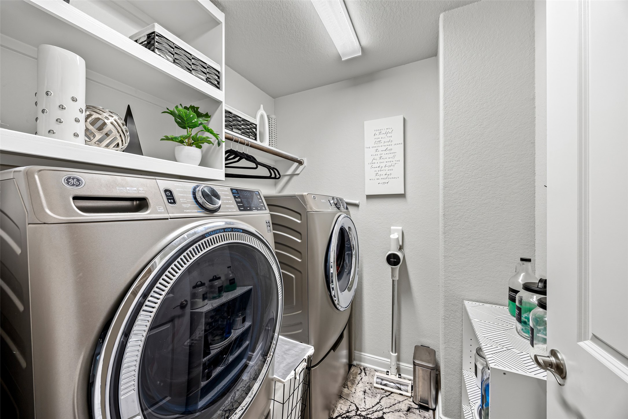 2823 Skerne Forest Drive Spring, TX 77373 - Photo 33 of 43 a utility room with dryer and washer