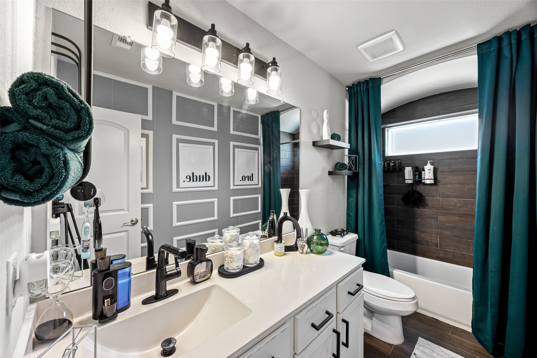 2823 Skerne Forest Drive Spring, TX 77373 - Photo 37 of 43 a bathroom with a sink a toilet and shower