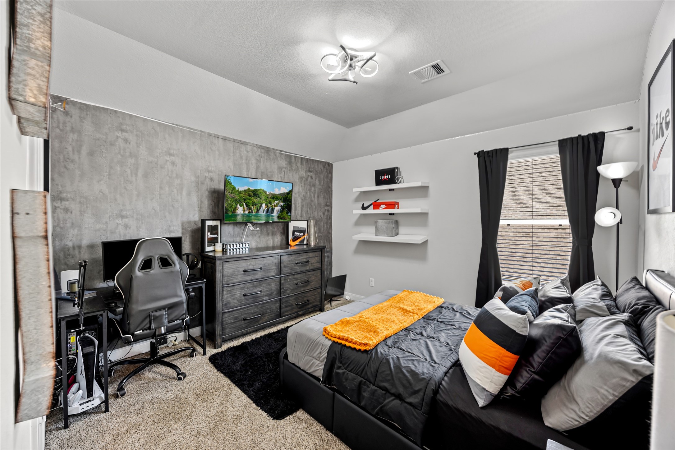 2823 Skerne Forest Drive Spring, TX 77373 - Photo 38 of 43 a bedroom with a bed and gym equipment