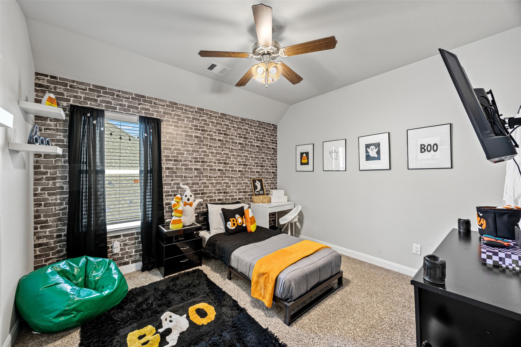 2823 Skerne Forest Drive Spring, TX 77373 - Photo 39 of 43 a bedroom with a bed dresser and a window