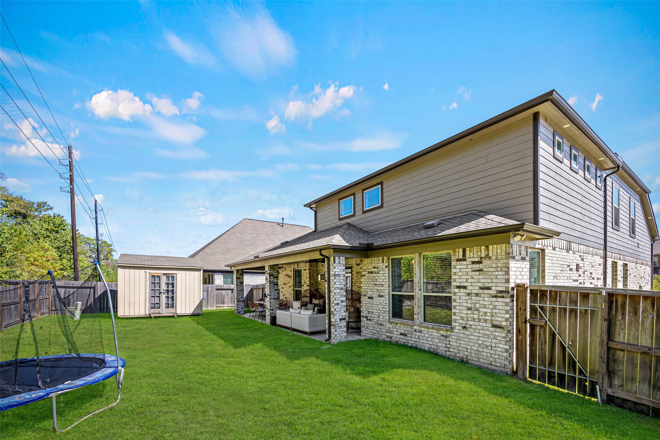 2823 Skerne Forest Drive Spring, TX 77373 - Photo 42 of 43 a view of a house with a yard