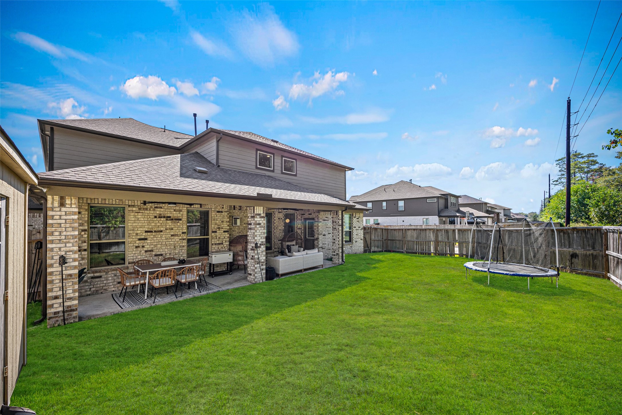 2823 Skerne Forest Drive Spring, TX 77373 - Photo 43 of 43 a view of a house with a yard and sitting area