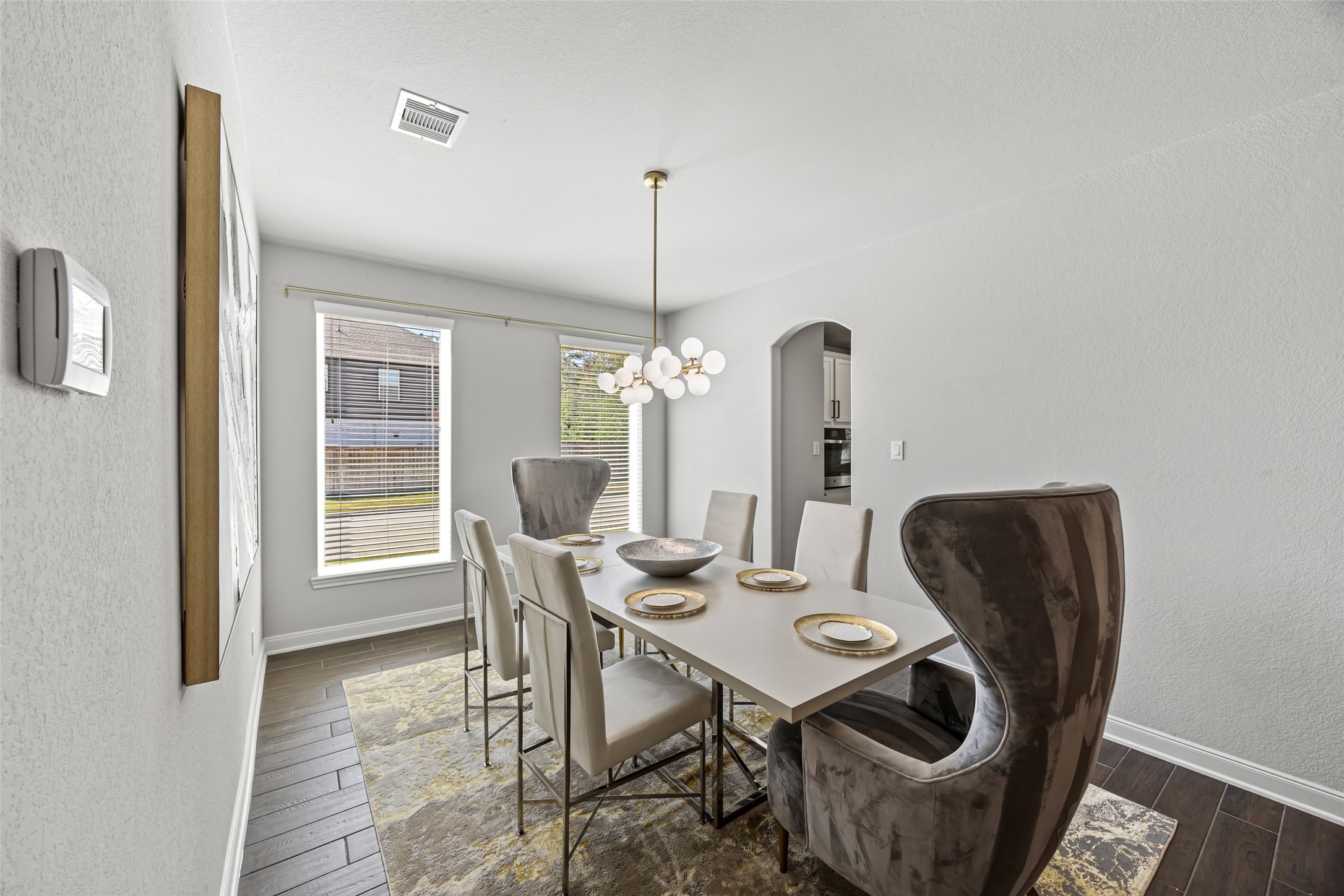 2823 Skerne Forest Drive Spring, TX 77373 - Photo 9 of 43 a view of a dining room with furniture and chandelier