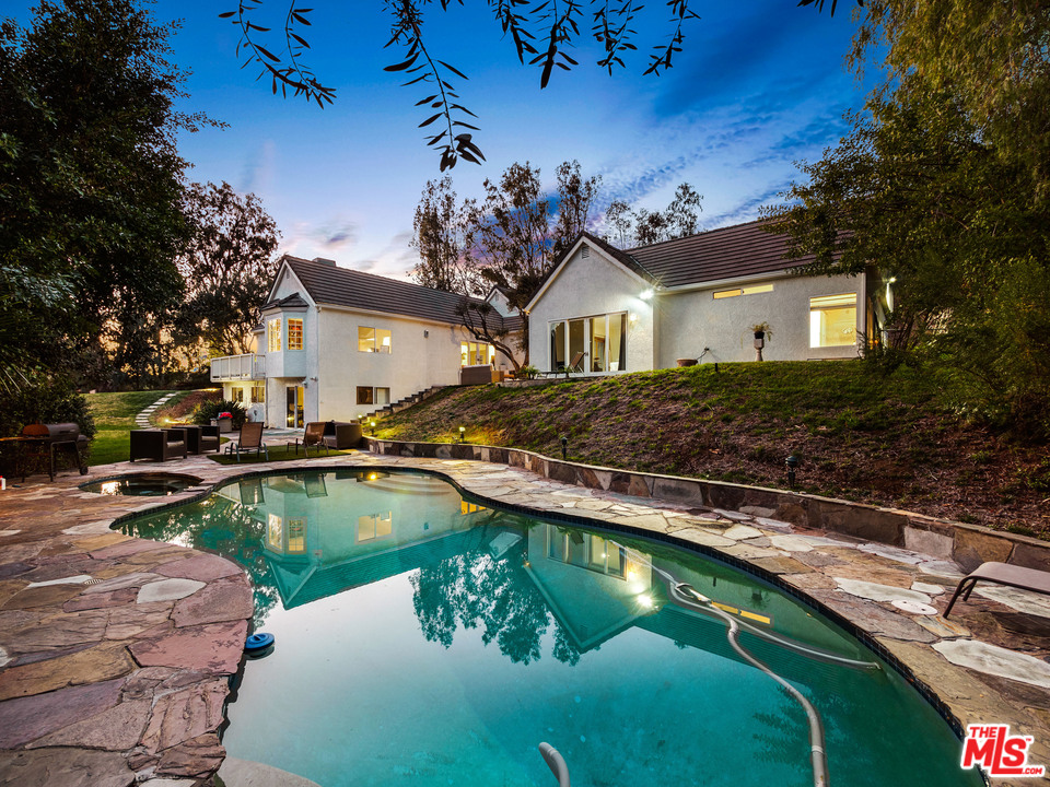 2069 Cold Canyon Road Calabasas, CA 91302 - Photo 8 of 34 a view of a house with pool