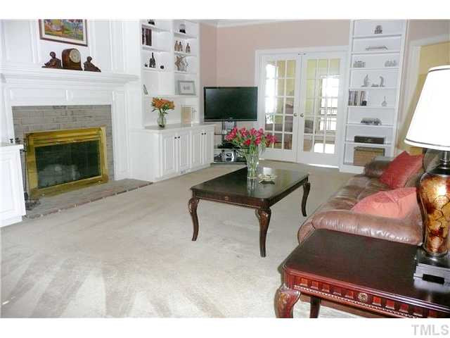 5116 Salem Ridge Road Holly Springs, NC 27540 - Photo 10 of 25 The French doors can be left open while entertaining or closed if wanting a more private environment in the formal living room - the choice is yours. Living Room