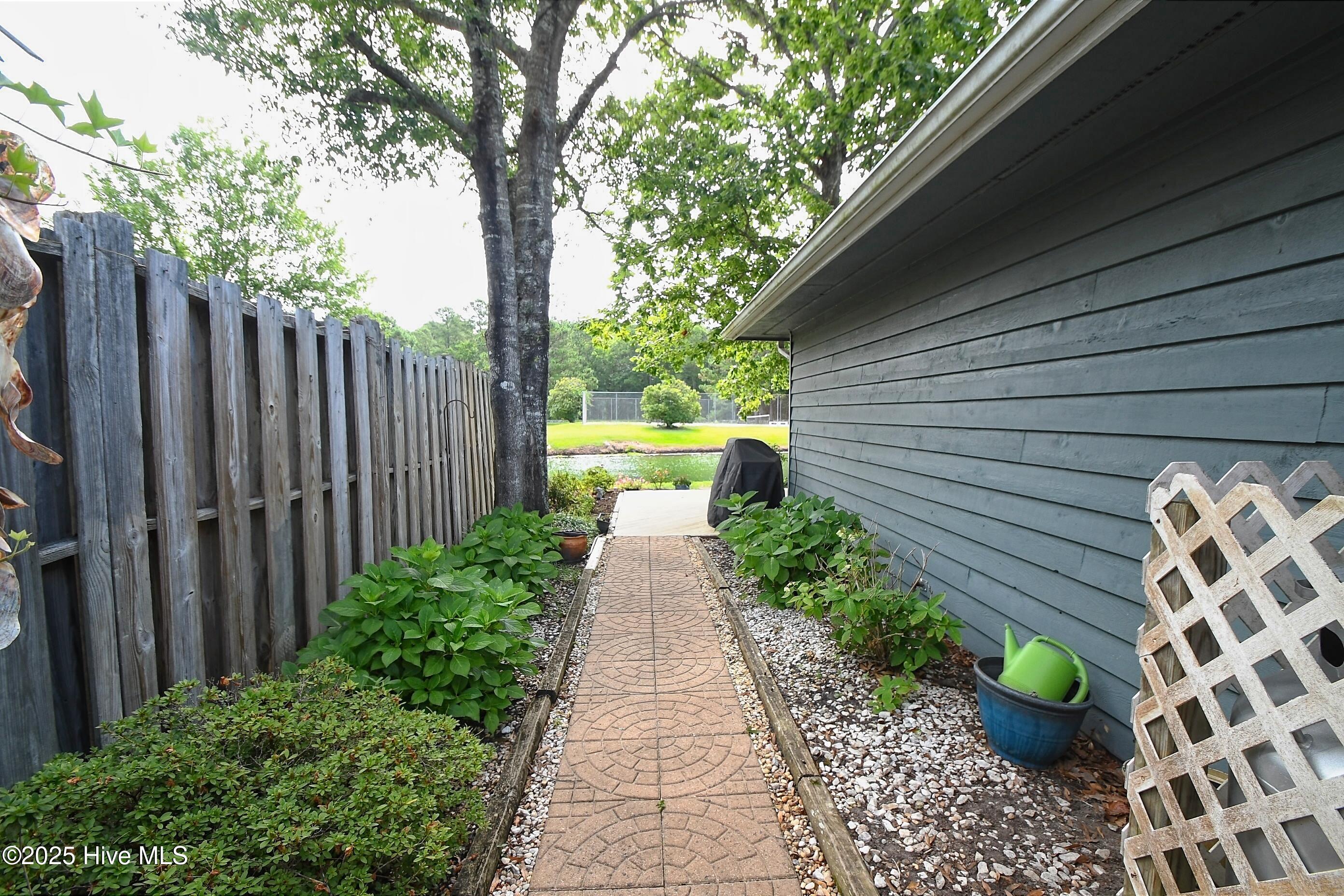 86 Cedar Tree Lane Southwest Calabash, NC 28467 - Photo 26 of 36 Side of the house