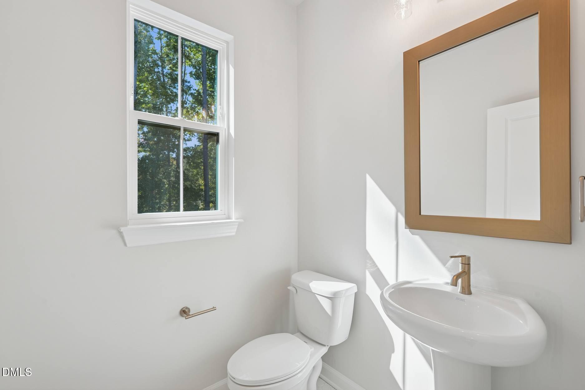 4715 Mint Leaf Lane Raleigh, NC 27612 - Photo 12 of 14 Elm Park 35_Powder Room_10.9.25_webready