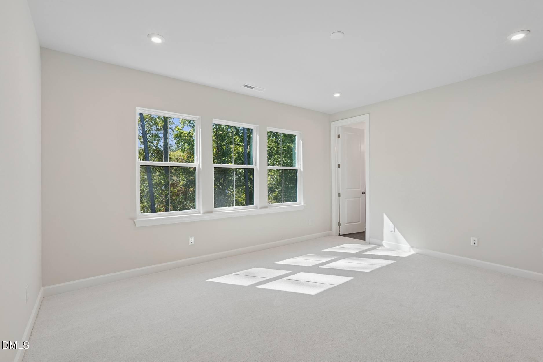 4715 Mint Leaf Lane Raleigh, NC 27612 - Photo 14 of 14 Elm Park 35_Primary Bedroom_10.9.25_webr