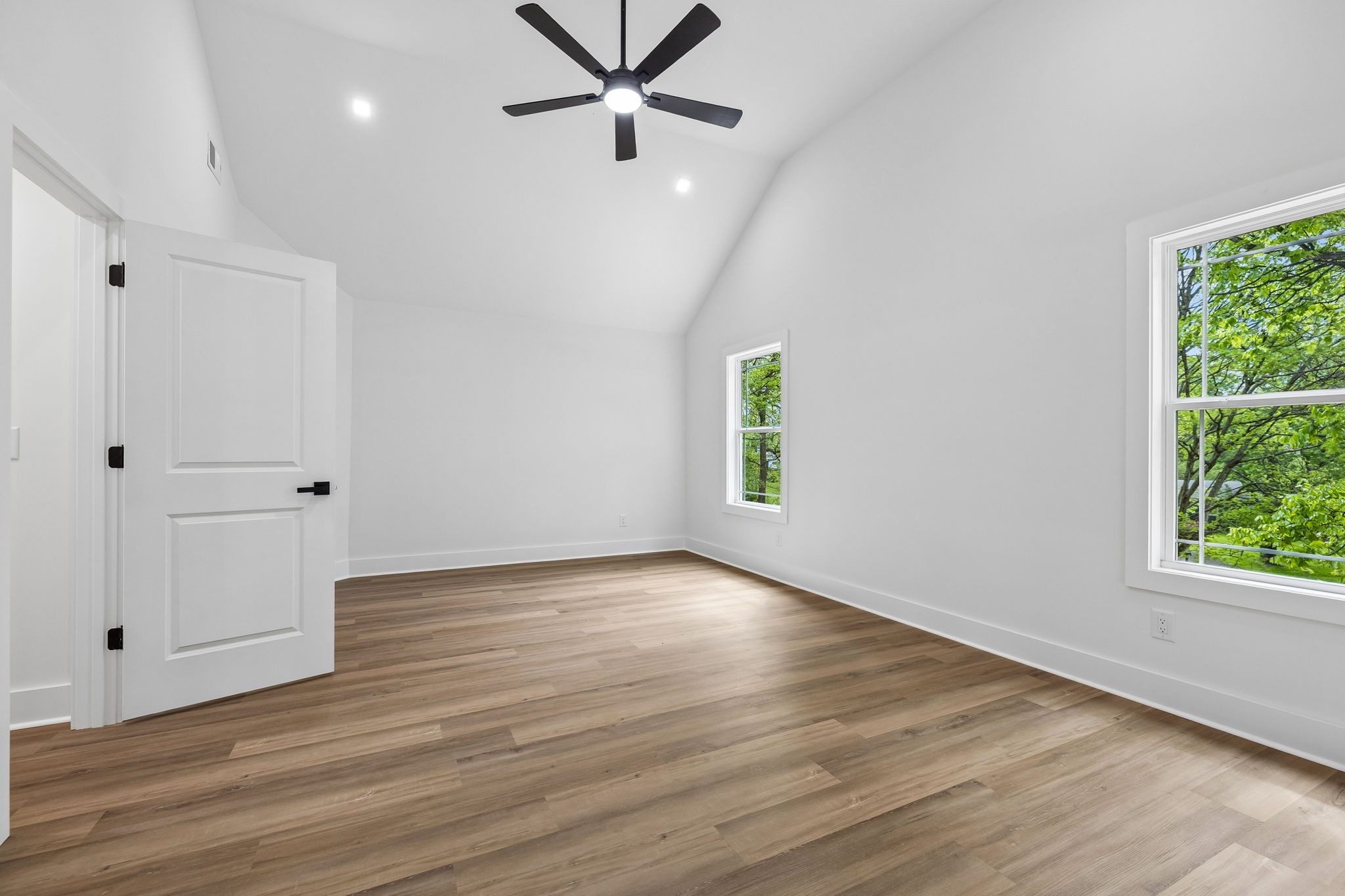 419 North Mabel Street Springfield, TN 37172 - Photo 21 of 34 a view of an empty room with wooden floor and a window