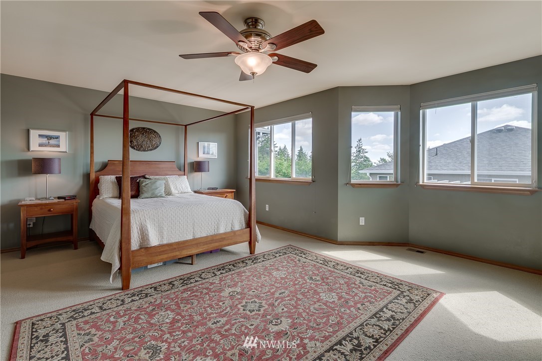 21105 1st Avenue West Bothell, WA 98021 - Photo 22 of 40 a bedroom with a bed and a window