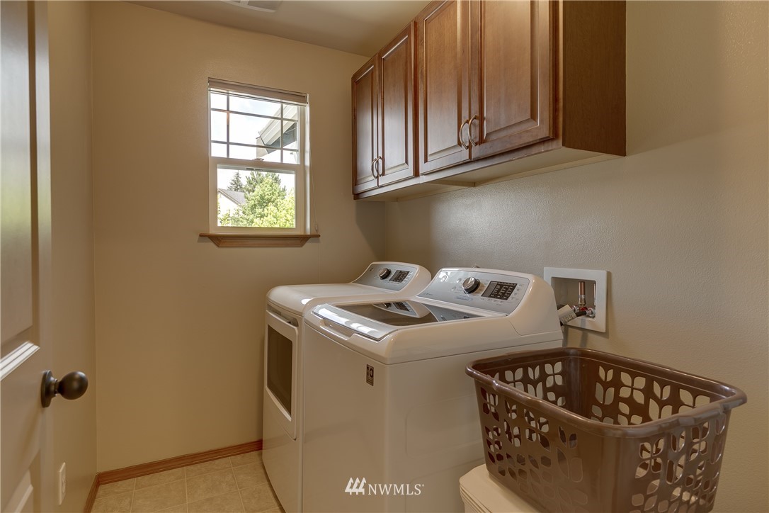 21105 1st Avenue West Bothell, WA 98021 - Photo 32 of 40 a utility room with dryer and washer
