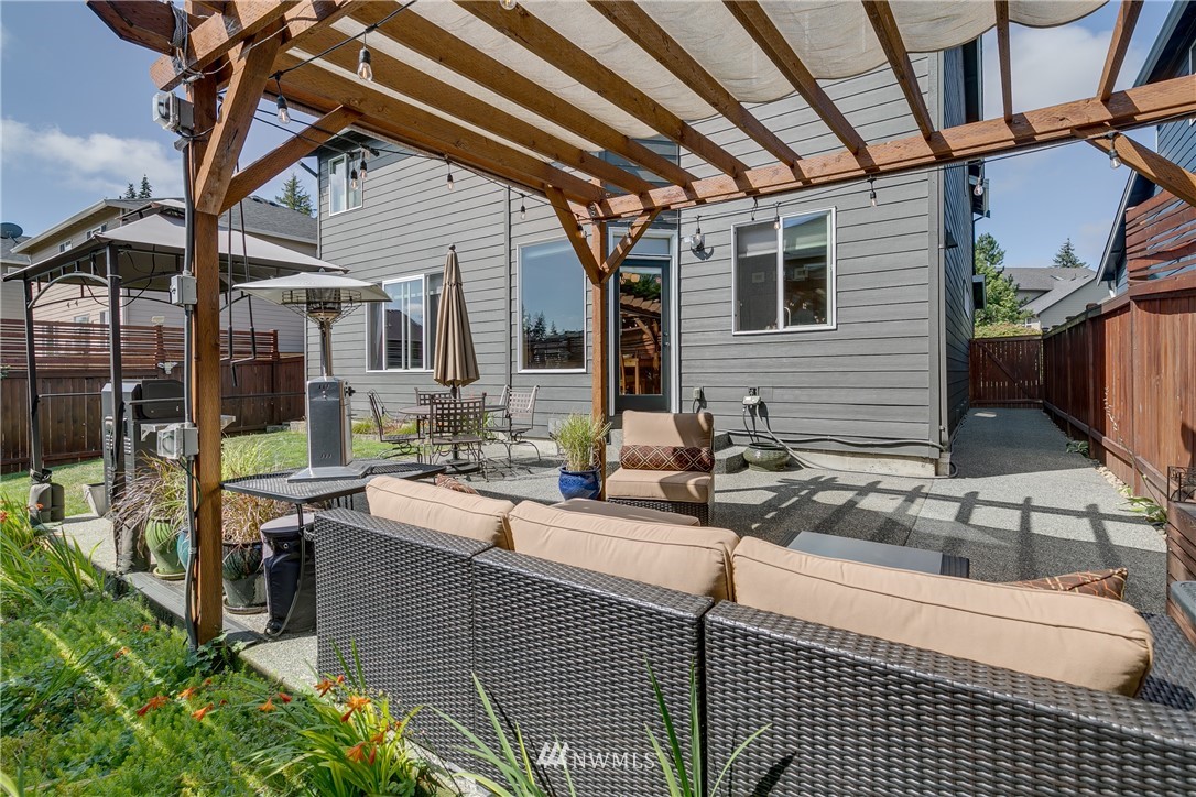 21105 1st Avenue West Bothell, WA 98021 - Photo 35 of 40 a view of a chairs and table in the patio