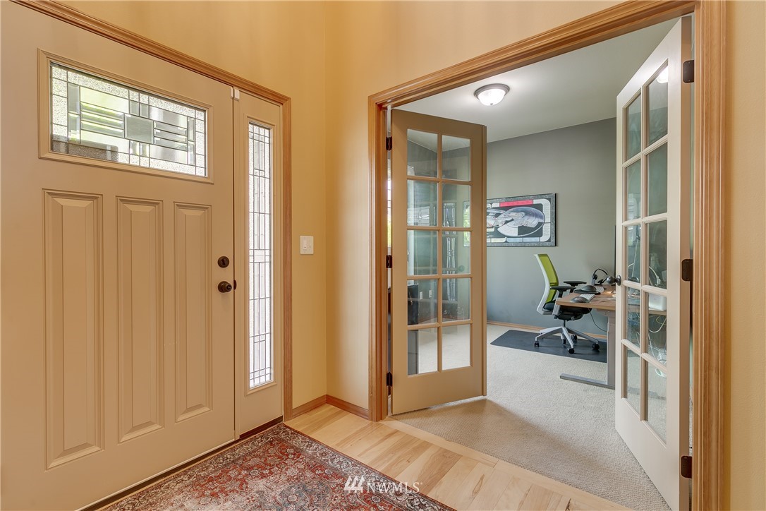 21105 1st Avenue West Bothell, WA 98021 - Photo 5 of 40 a view of an entryway and livingroom in right side