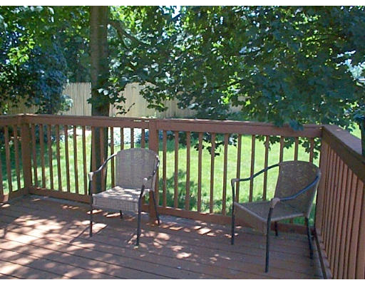 10 Angela Road Framingham, MA 01701 - Photo 16 of 19 a view of a bench in the backyard