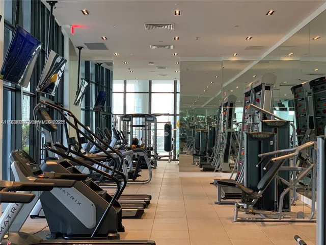 a view of a swimming pool with a lounge chairs