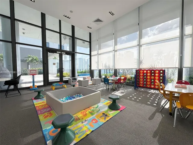 a view of a living room and dining room