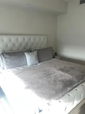 a view of a room with a rug