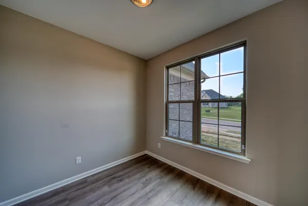 an empty room with windows