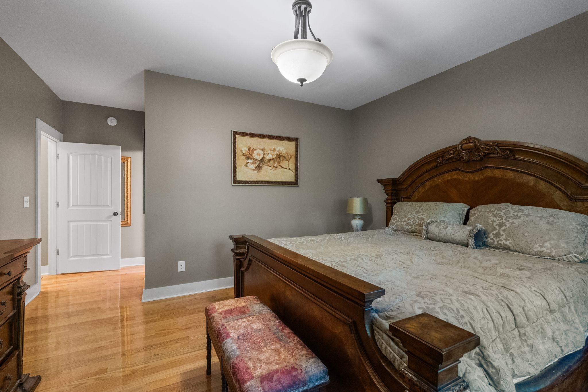 2504 Bearwallow Road Ashland City, TN 37015 - Photo 21 of 48 a bedroom with a bed and wooden floor