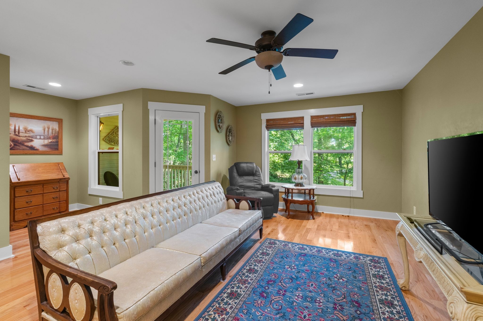2504 Bearwallow Road Ashland City, TN 37015 - Photo 34 of 48 a living room with furniture and a flat screen tv