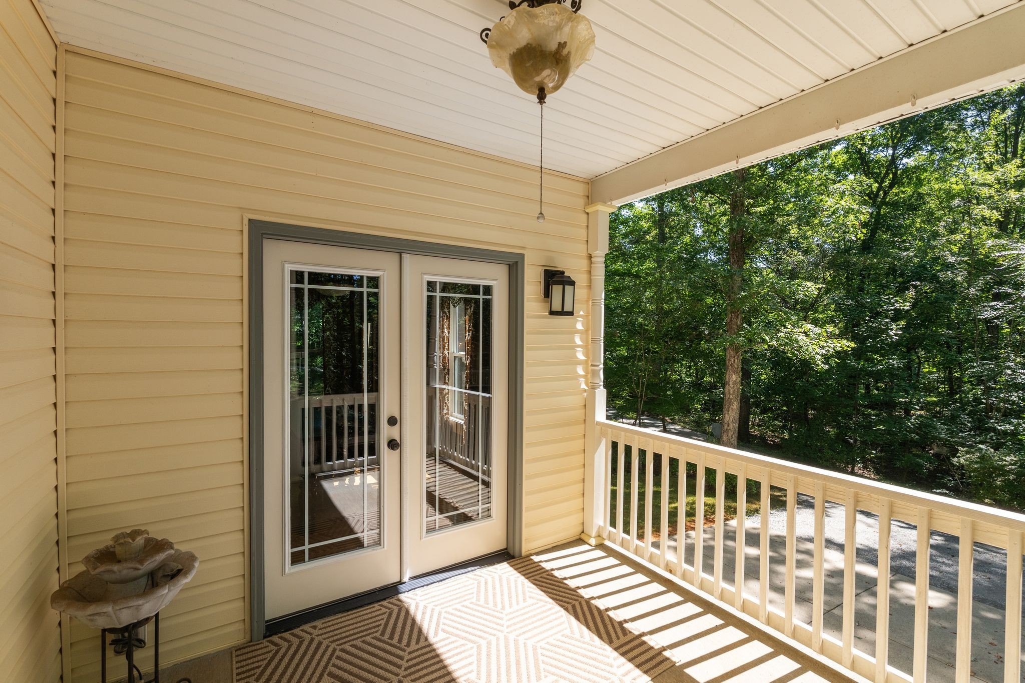 2504 Bearwallow Road Ashland City, TN 37015 - Photo 37 of 48 a view of a balcony with a potted plant