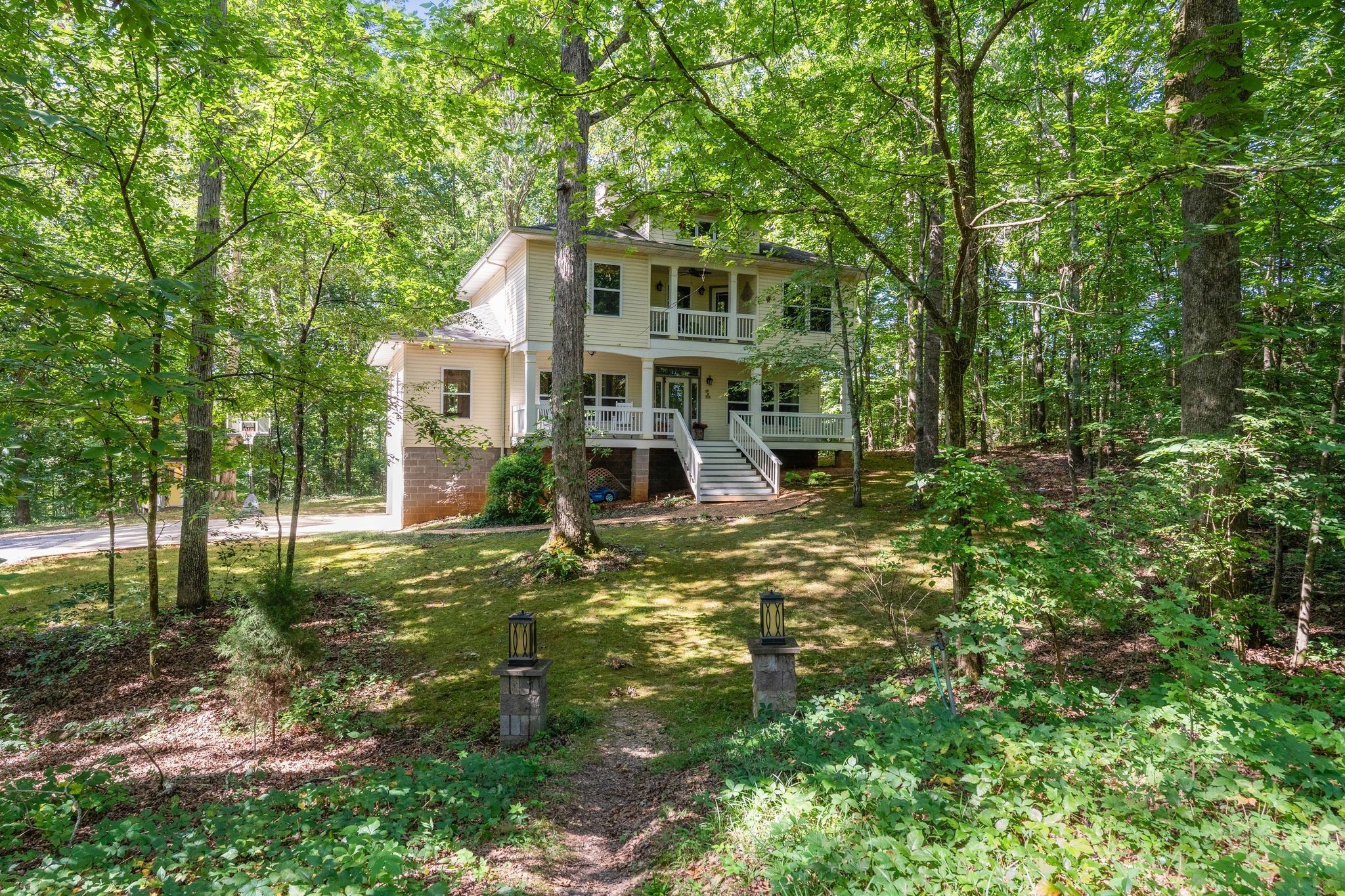 2504 Bearwallow Road Ashland City, TN 37015 - Photo 5 of 48 front view of a house with a small yard