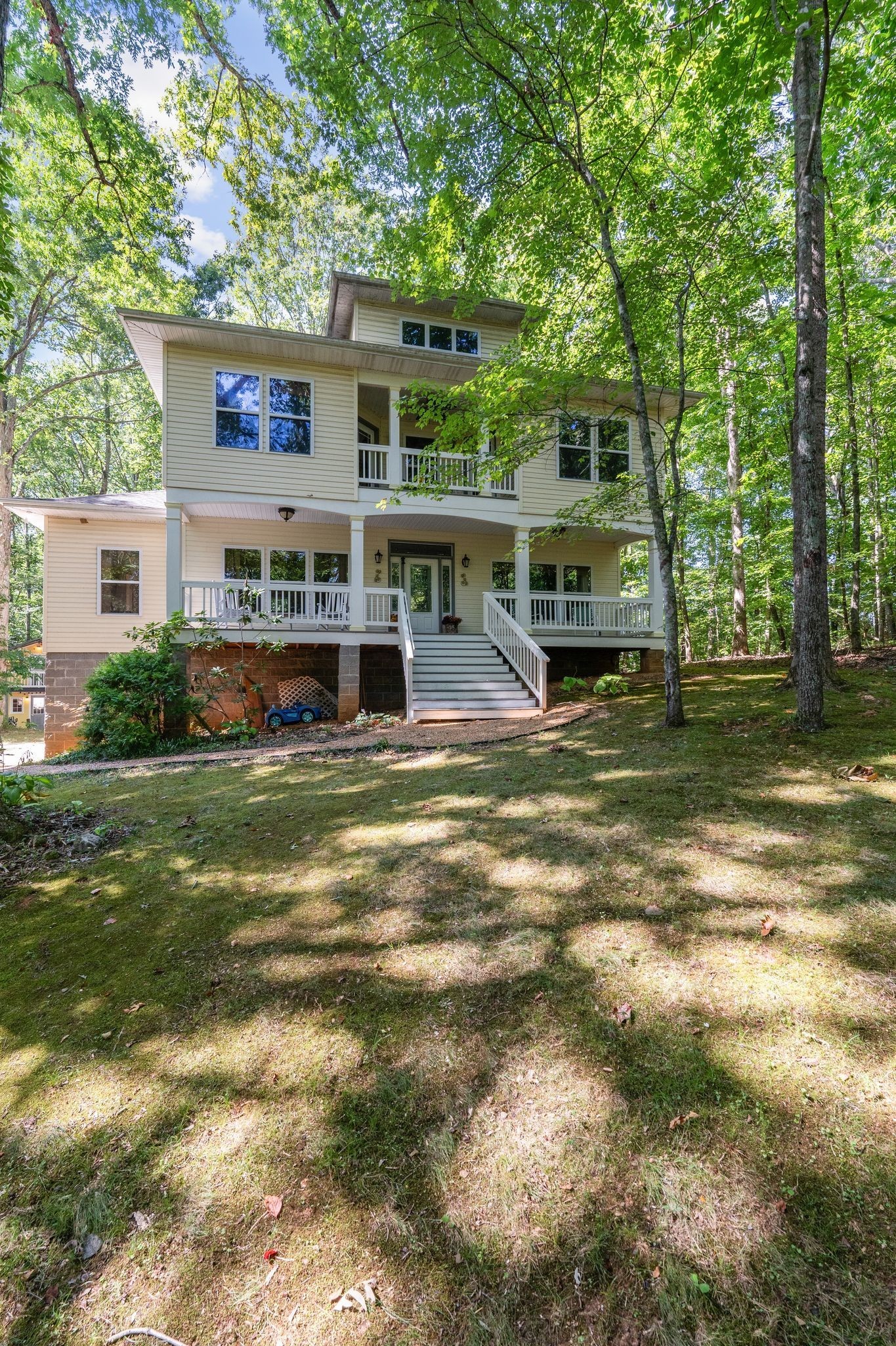 2504 Bearwallow Road Ashland City, TN 37015 - Photo 7 of 48 a view of a house with backyard and sitting area