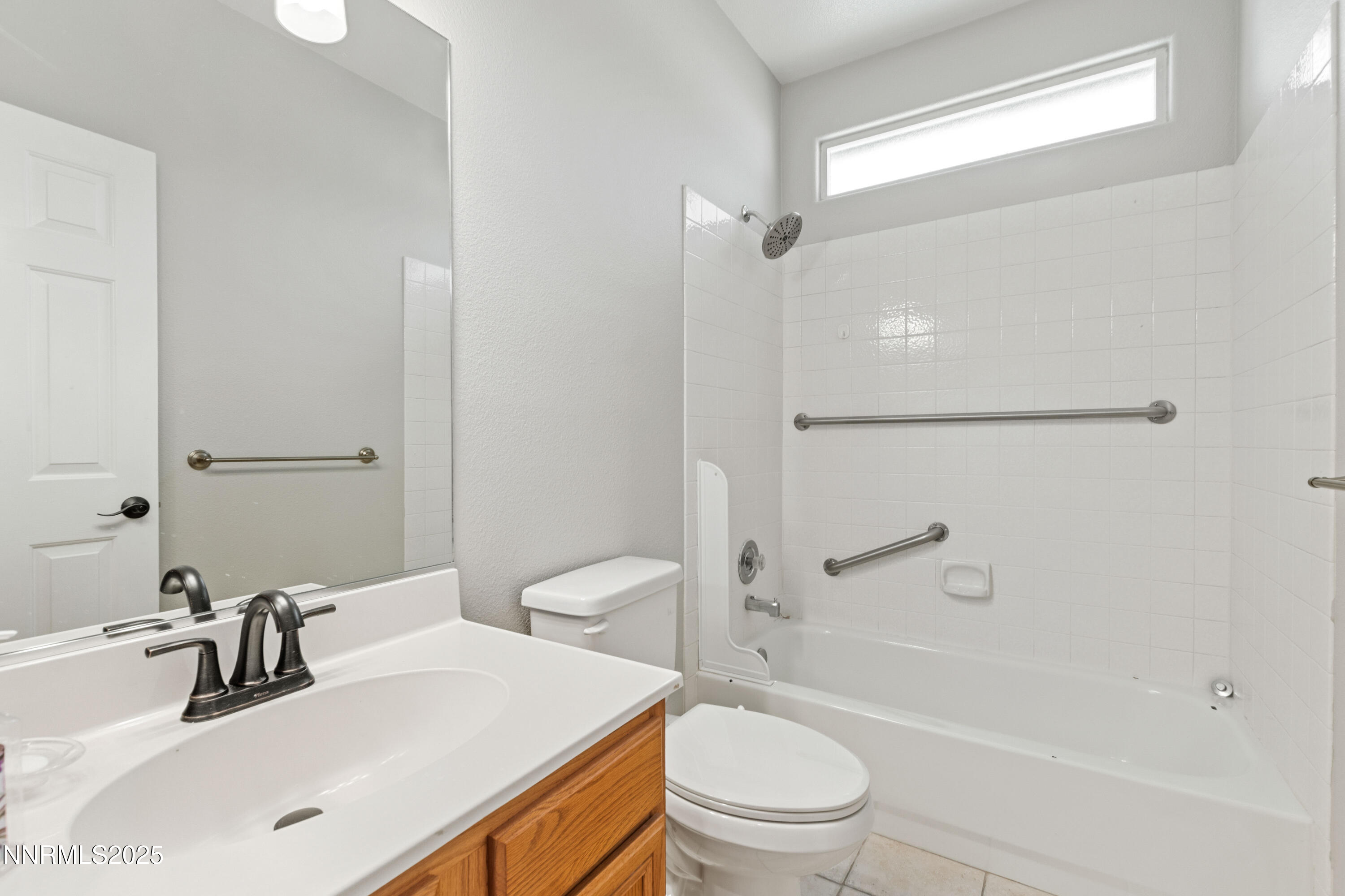860 Caughlin Crossing Reno, NV 89519 - Photo 17 of 21 a bathroom with a sink a toilet and shower