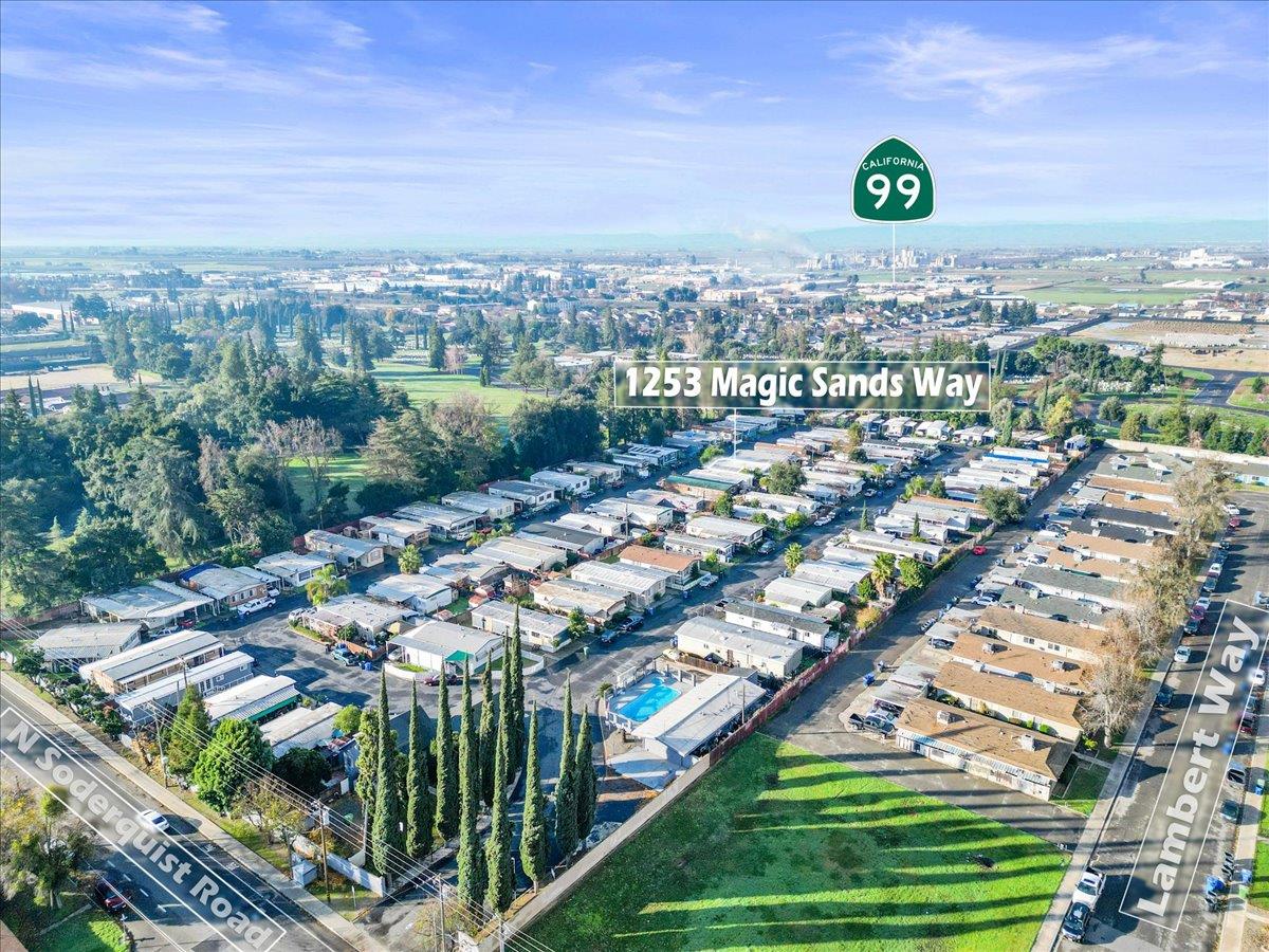 1253 Magic Sands Way Turlock, CA 95380 - Photo 2 of 5 an aerial view of a city